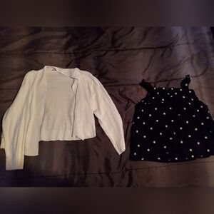 girl 12 black sleeveless top with white daisy and white cardigan